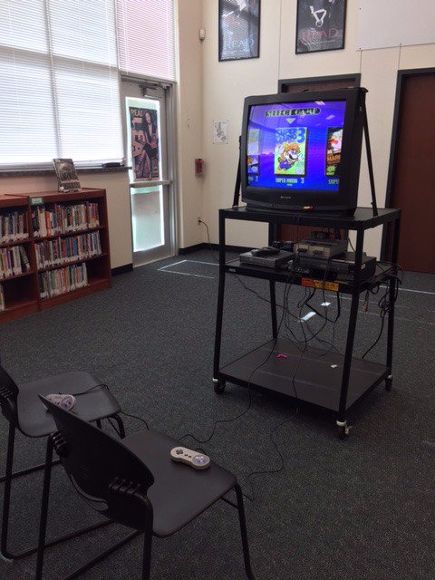 WNGALibrary's tweet photo. Come in &amp; play super mario with us! How many levels can you pass?Classics never get old even if tvs do LOL #rollingTV #oldschool https://t.co/PgjL0VOGMd