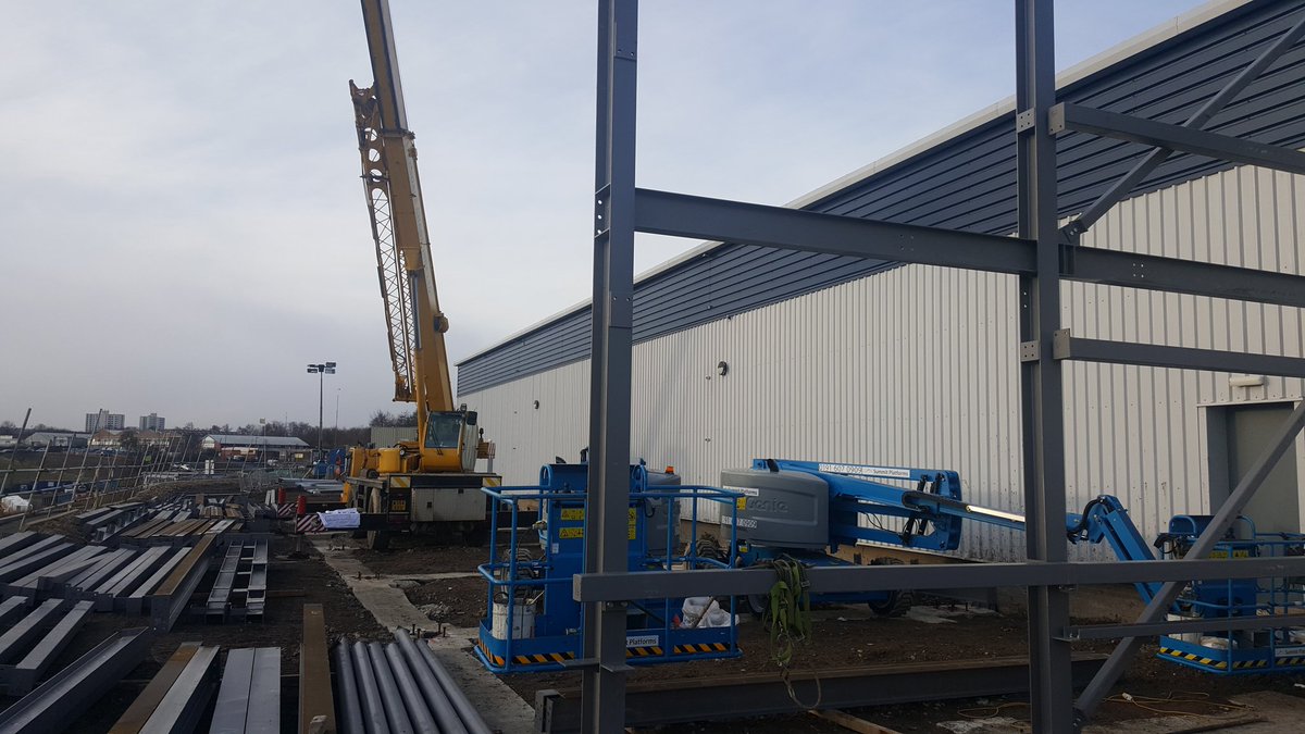 SimonStormTemp's tweet photo. Steel frame erection underway @jdrcables factory extension. Good H&amp;S Management of site by @Tolentplc https://t.co/gpe0WH8cow