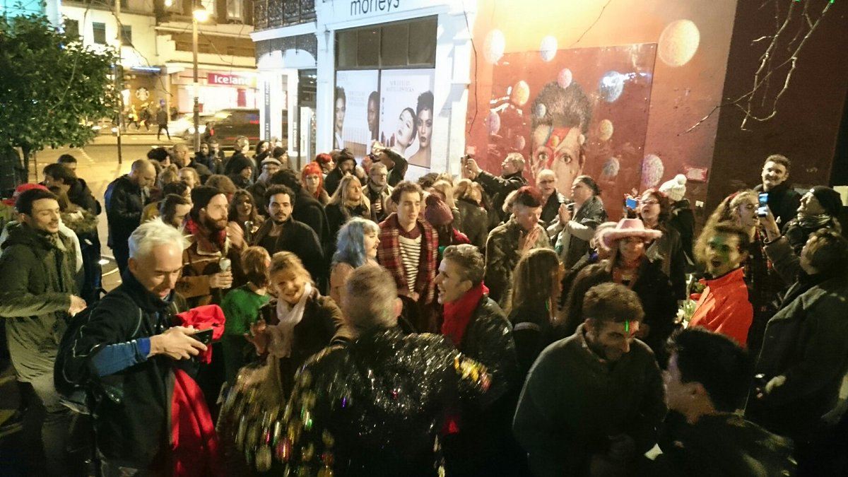 brixtonbuzz's tweet photo. Moving scenes at the David Bowie mural in Brixton #bowie https://t.co/0FLTeOwUhO