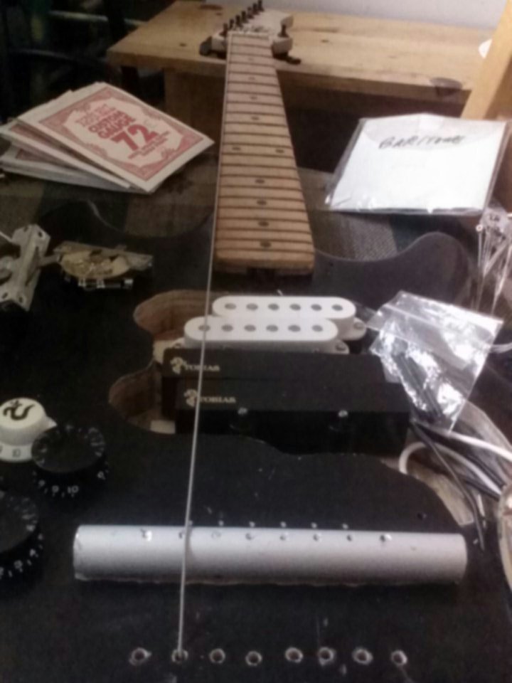 SkiyeSounds's tweet photo. Hmm, this has been hard enough. Now it's not lining up. Have to spring for the 8string hipshot tail/bridge #Stringamajig #luthier #invention https://t.co/FGFg48i8GF