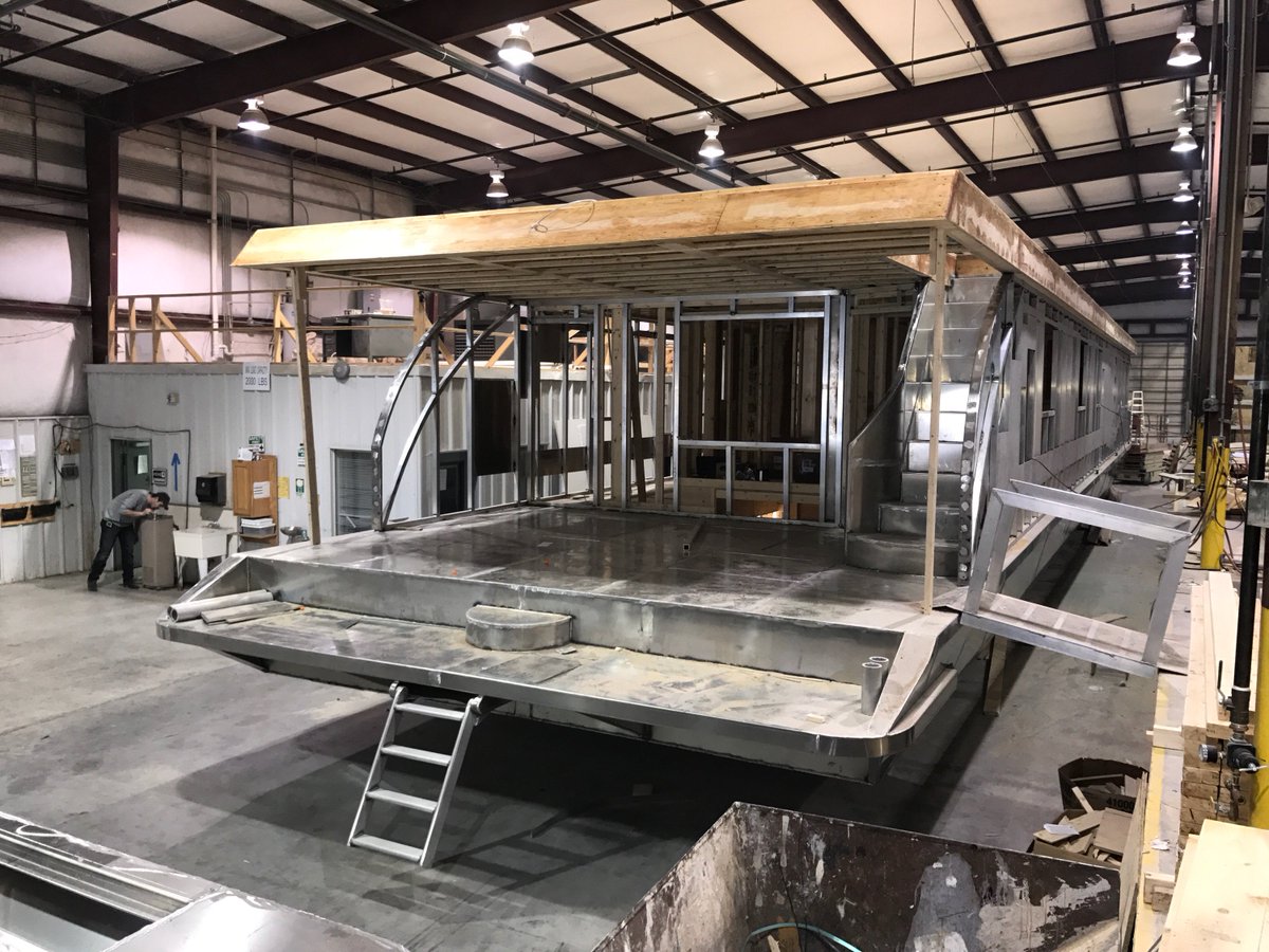 C4CLKN's tweet photo. New Yacht construction updates:  Check out the amazing back deck with grand staircase on this yacht! #cruisethelake.com https://t.co/bPop7p3g6R