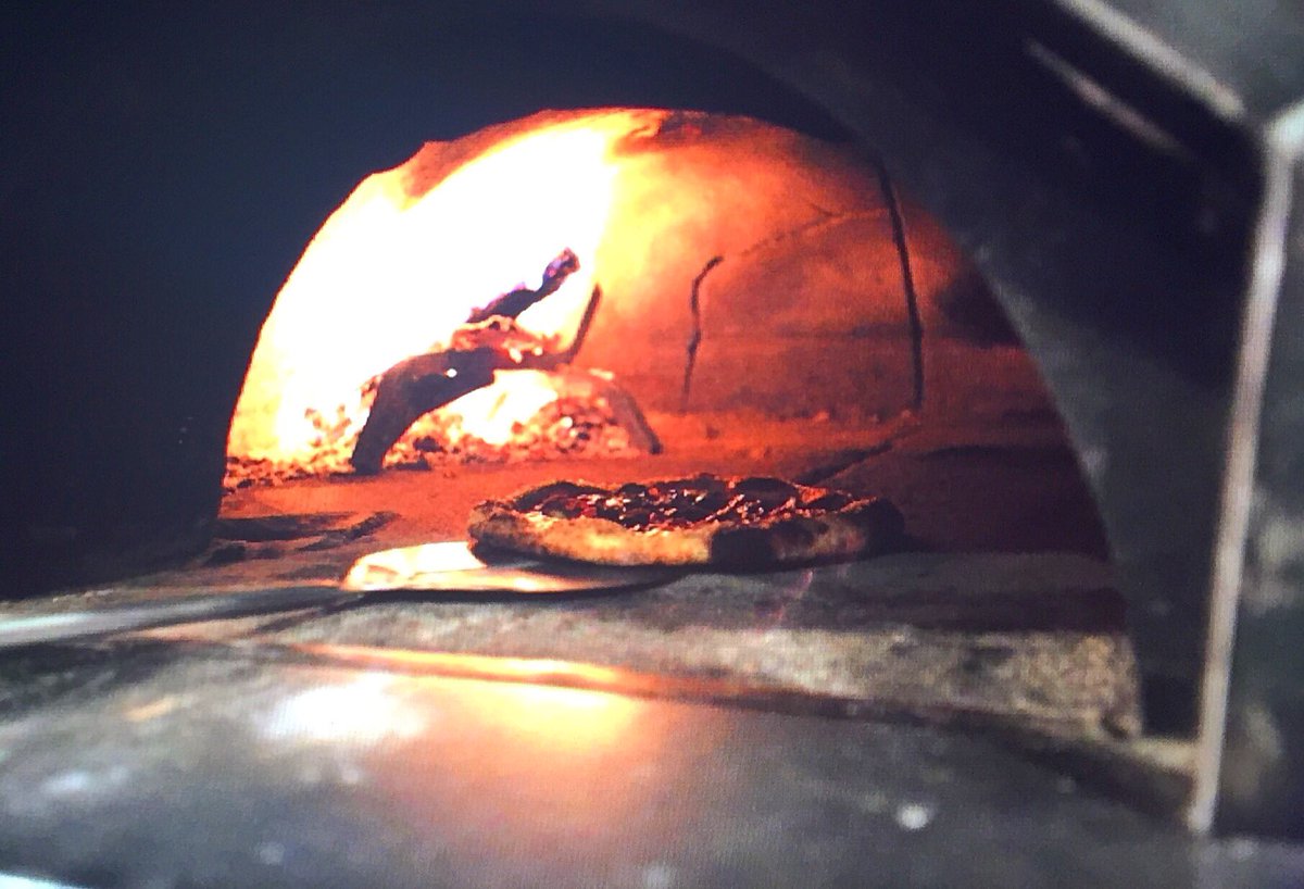 Fresh out of the forno pizza...Come in tomorrow for a taste! #openingday #localjasperave #localislocal #whoweare #yeg