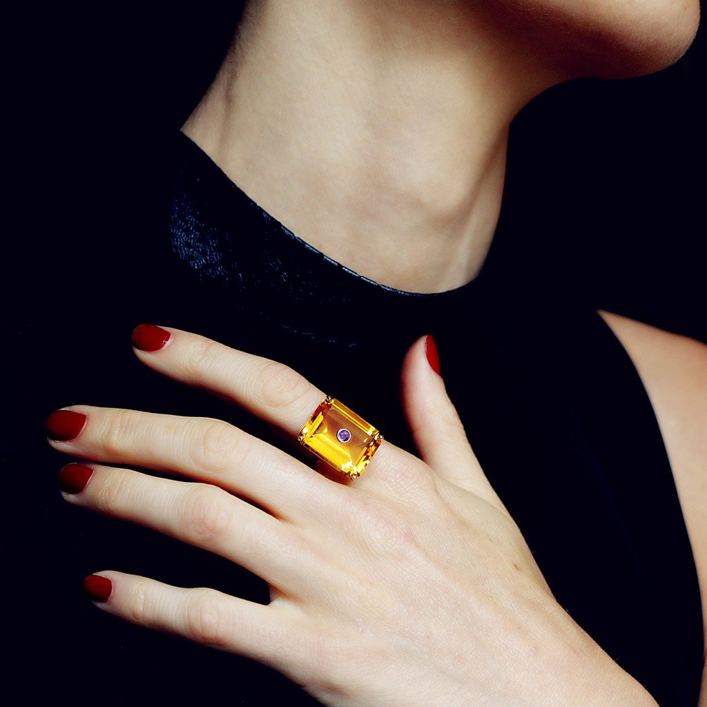 We love the striking colors of the "Nolita" cocktail ring. Made with a custom-cut citrine &amp; studded with a amethyst bit.ly/2j9TYy5