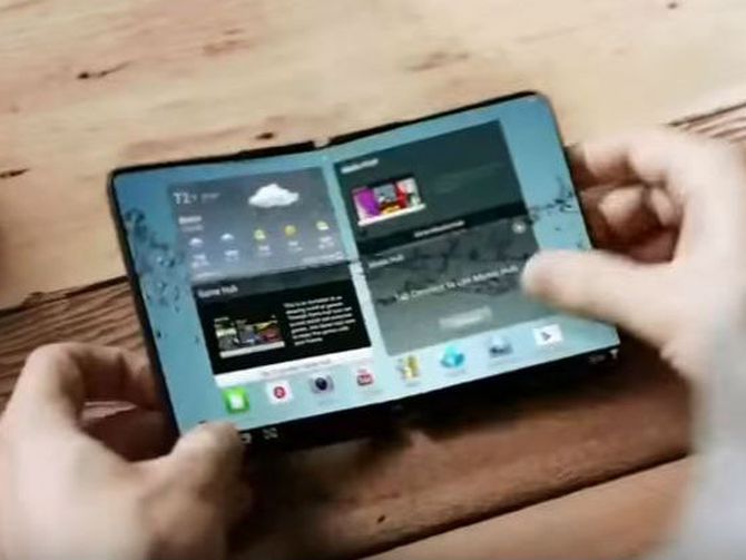 CNET's tweet photo. #Samsung seen unveiling foldable phone in third quarter https://t.co/MJWdyBPOyg https://t.co/I4HZz9iORg