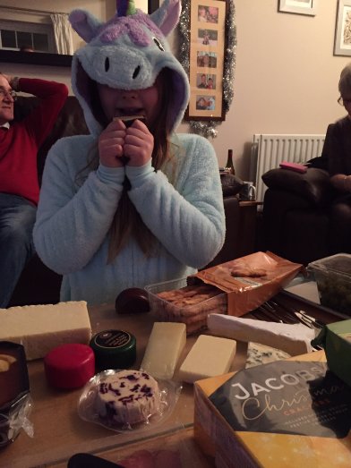 readingtree1's tweet photo. My daughter (aka Unicorn) getting ready to try our Tesco Finest cheeseboard on Xmas Day. We all agreed they were all yummy! #TriedItFree https://t.co/PGe5aNCFqH
