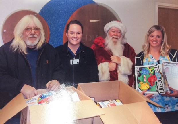 TrinityHealthMI's tweet image. A #holiday blessing: The American Bikers Aiming Toward Education  donates gifts to our Hackley pediatric patients: bit.ly/2itdX8r