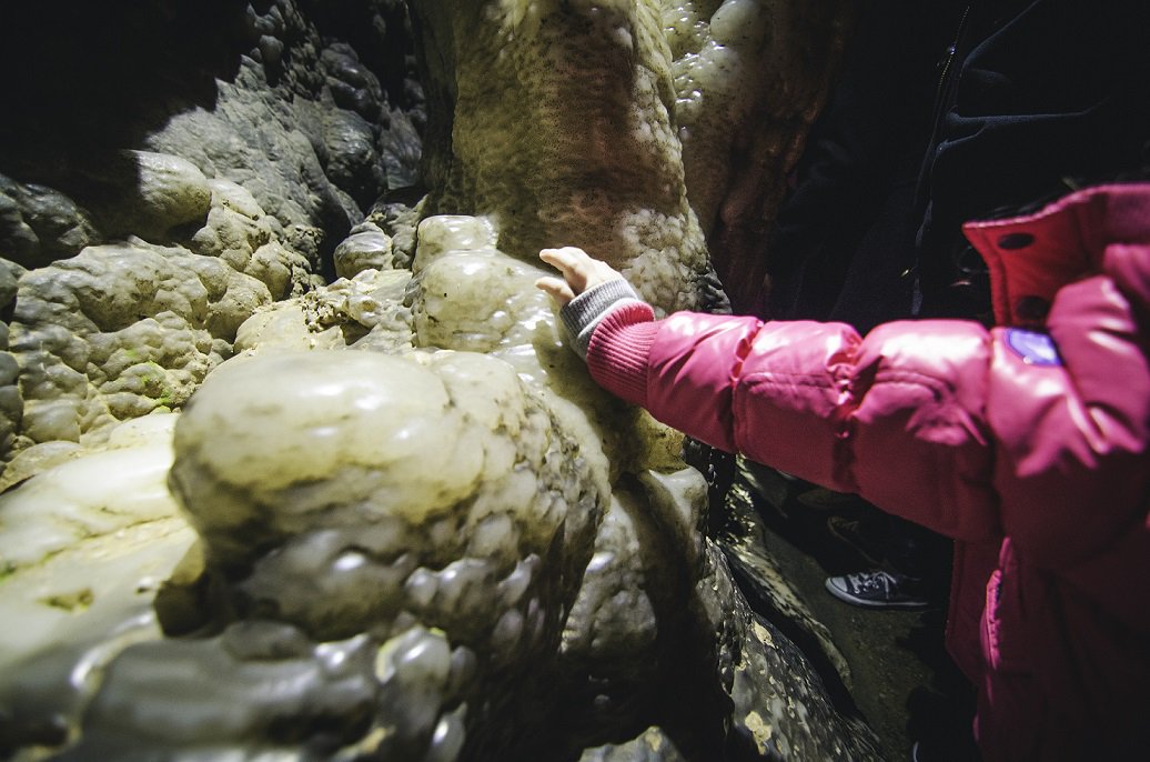 rubyfallscave's tweet photo. Don't forget to rub the Cactus & Candle for good luck when you see #RubyFalls! #CaveFormations #CaveAdventure https://t.co/rOIBEaccHc