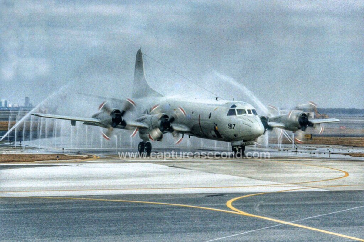 captureasecond's tweet image. P-3C Orion being washed at KJAX, 2002. @USNavy #p3c #orion #kjax @avgeek #maritime #captureasecond