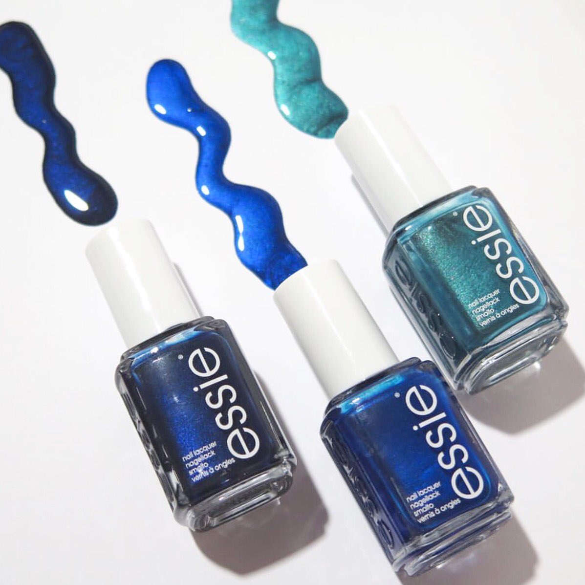 essie's tweet photo. Talk about blues! Which shade is your fave? (Left to Right: #midnightcami #arubablue #trophywife) https://t.co/hhFOlBm0Dc https://t.co/kYSD0g31bQ