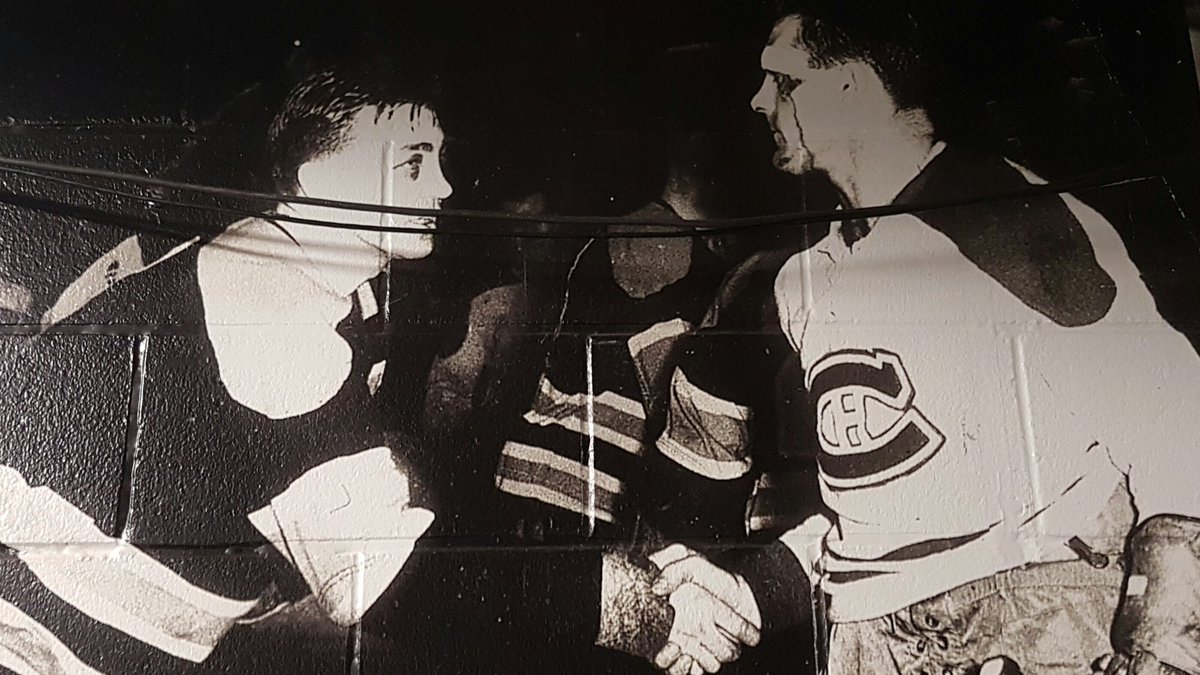awesome pic in hallway at TD Garden in Boston....sums up the Bruins Habs rivalry and the game itself