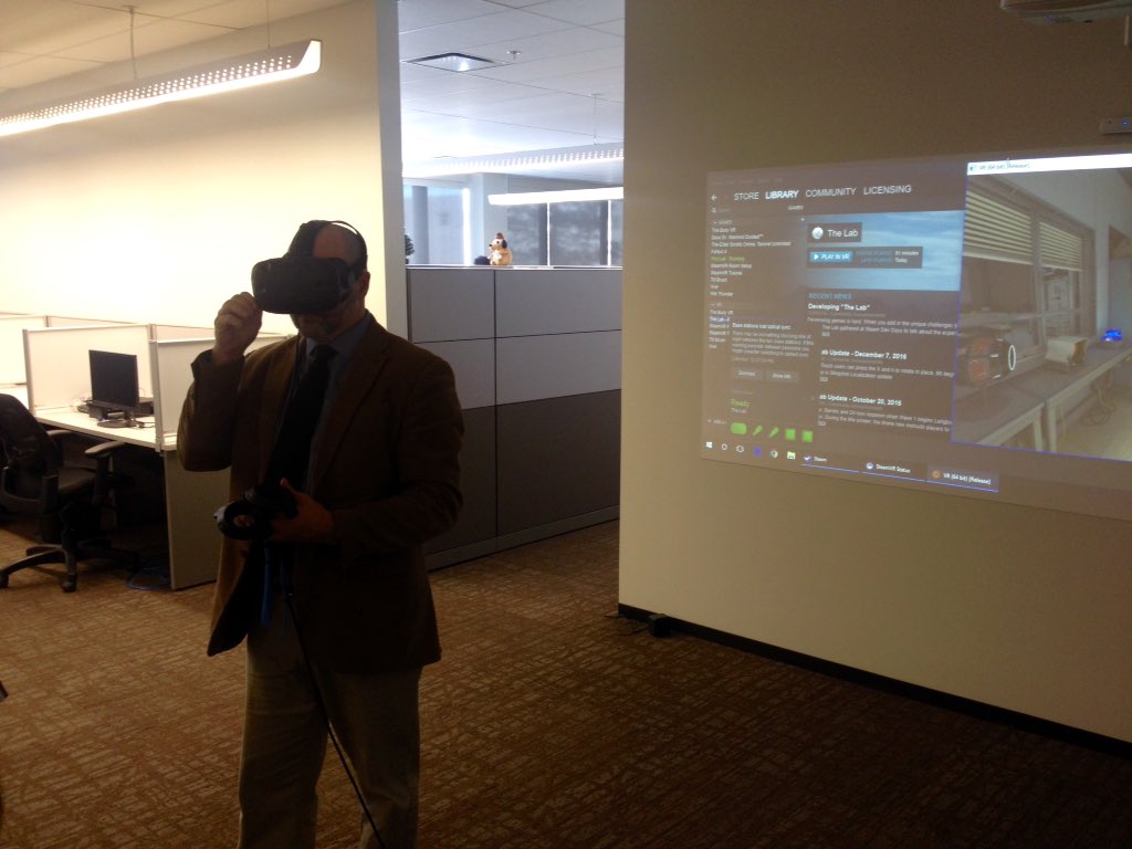 CompuVisionBiz's tweet photo. Testing out the new #tech #toys at our new office! @NurevaInc @htcvive #YEG #YEGbiz #BeCurious https://t.co/goZJsLoOfa