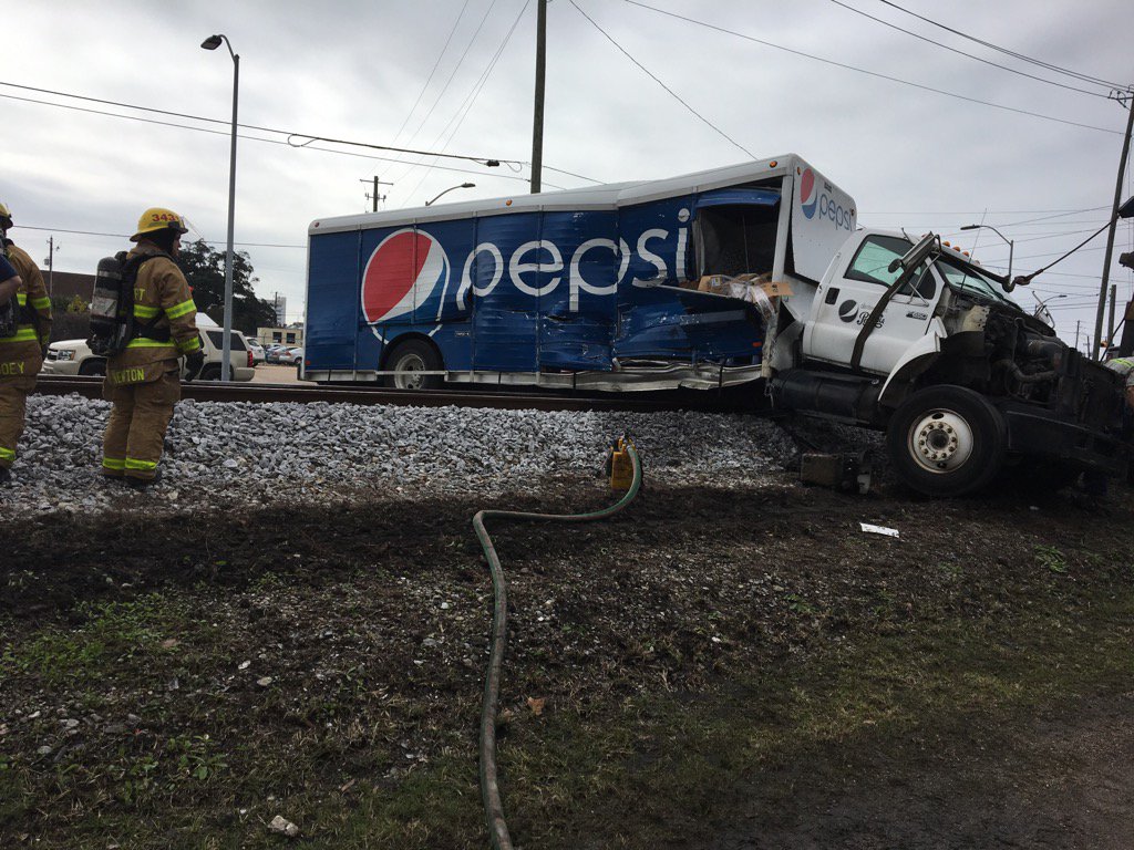 TrangPhamBui's tweet photo. On scene now covering CSX train collision with Pepsi truck in Biloxi. https://t.co/L1JxL5muvn