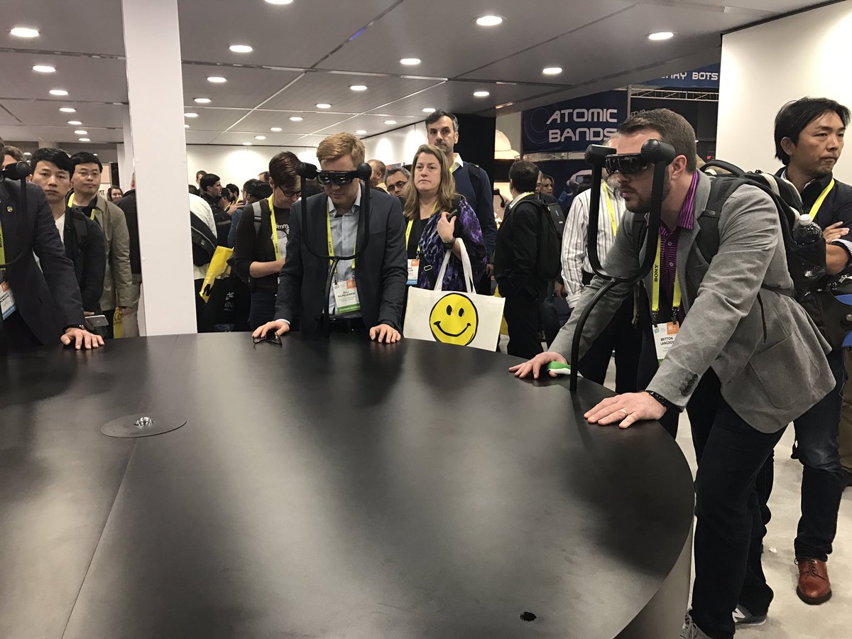 msuitetech's tweet photo. @BrittonLangdon trying out the ODG R9 augmented reality glasses at CES. #CES2017 #AR #FabPro1 https://t.co/213P5Z72Bi