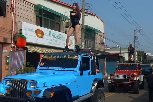 DailyMirror's tweet photo. Convoy of pole dancers performing sexy routines on top of beach buggies during bizarre funeral for top politician https://t.co/Xw3b6vkgjt https://t.co/OIIk7qKzTg