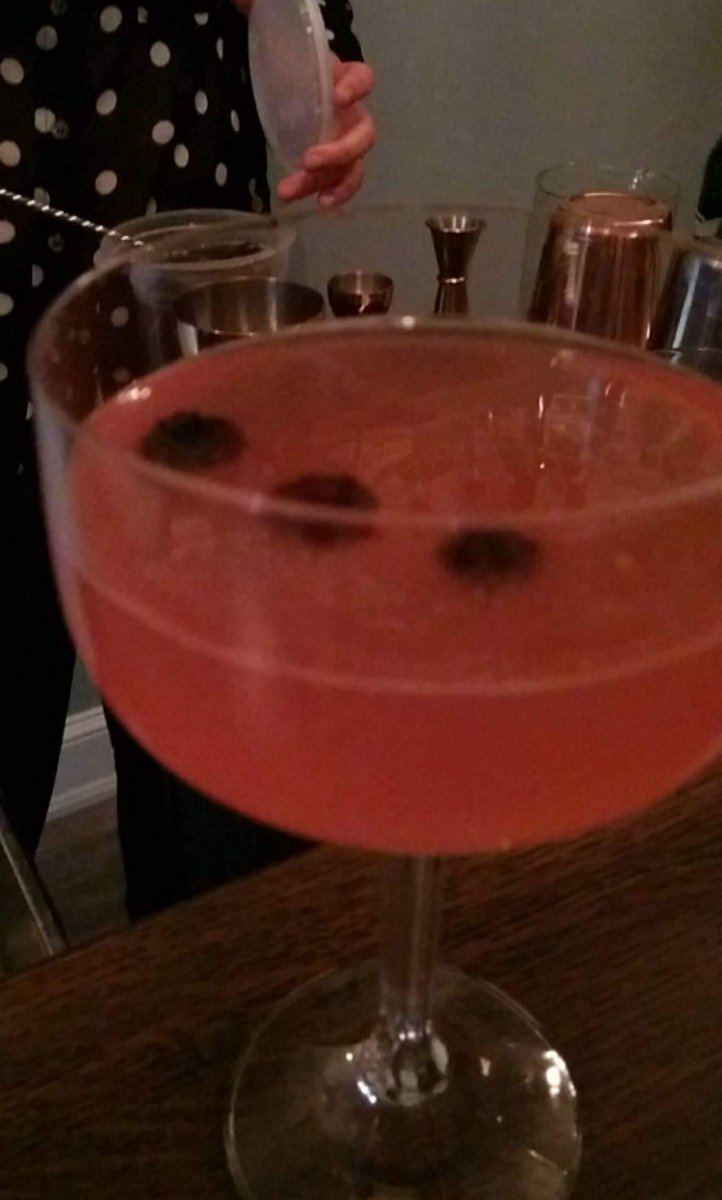 Kayla's first draft: Blueberry-Rosemary infused rum, Dolin dry, honey, lime. Lemon zest over top. Rum cured blueberries <a href="/bar_sazerac/">Bar Sazerac</a>