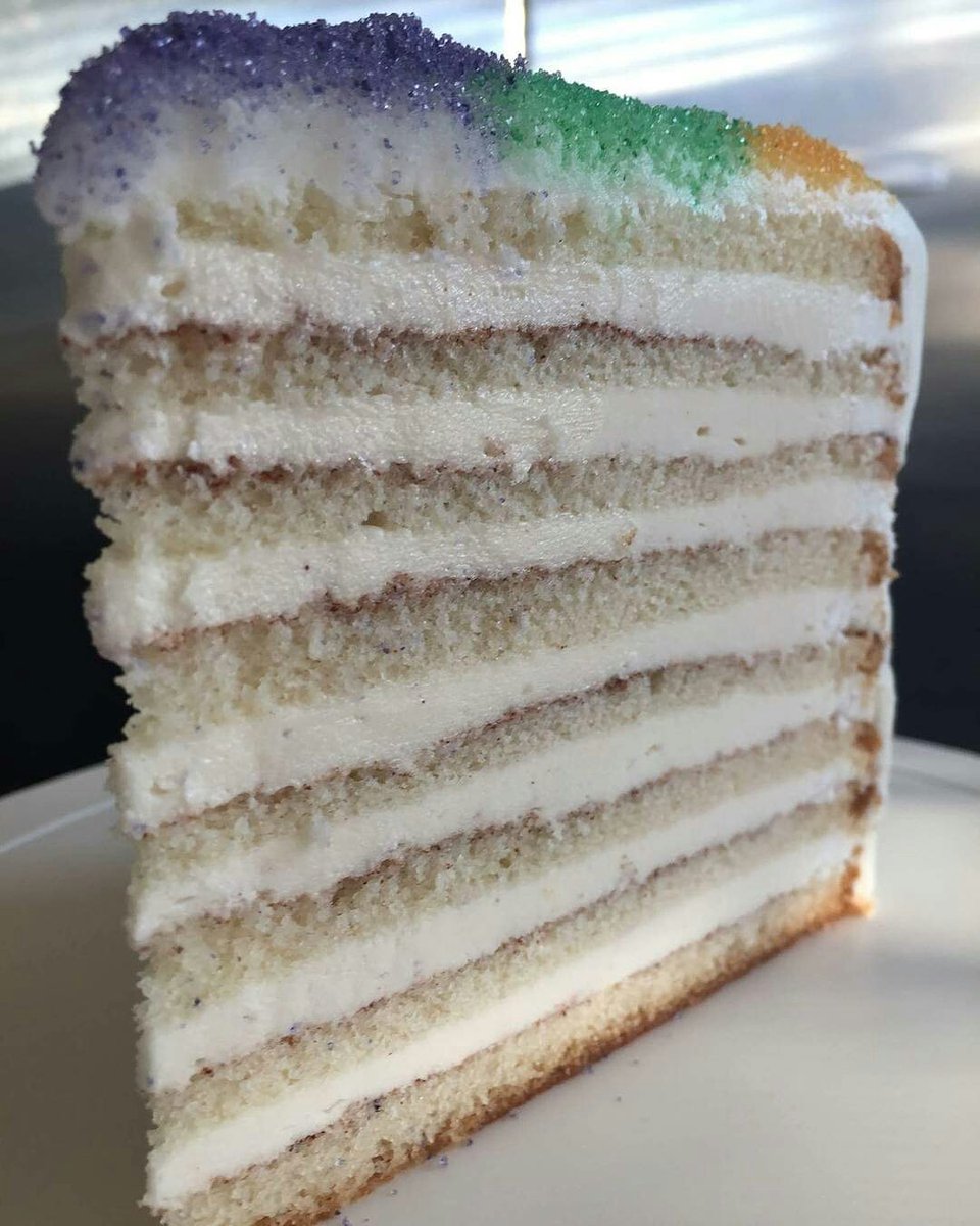 bakerybarnola's tweet photo. IT'S TIME! We've got Cream Cheese King Cake Doberge in the case, king cake dobites, and whole cakes for pick up. Happy Carnival! 💜💚💛 https://t.co/Cb1Jcb4smv