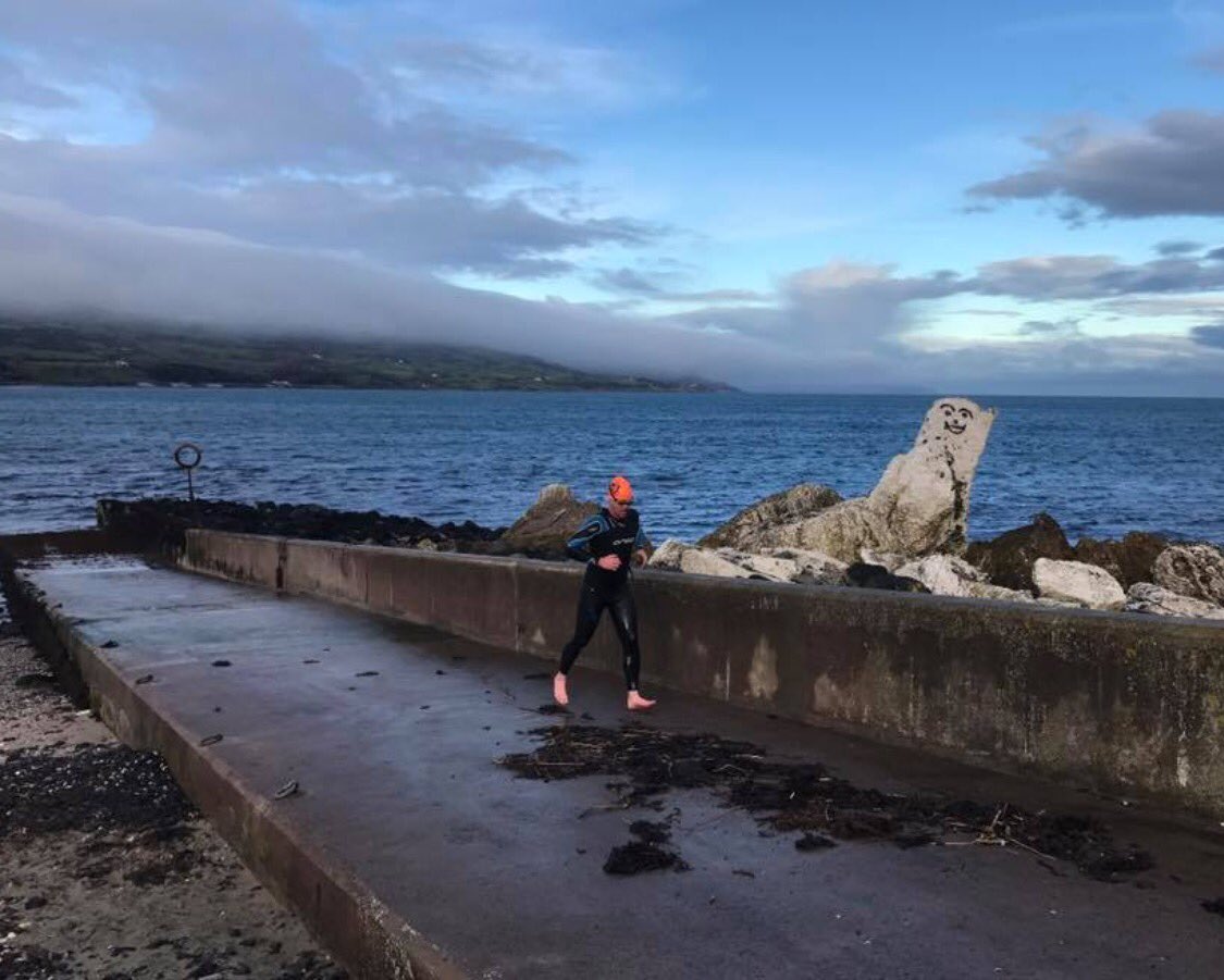 Father and son swim training in Ballygally, home of the White Bear Tri @race_check ❄️❄️❄️
