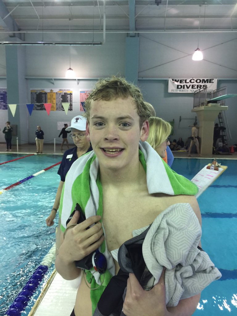 Brady Cawthon 3rd in his heat in 100 back