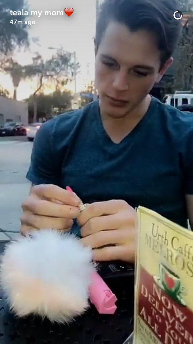 tealascandy's tweet photo. Lol I love how Alex is looking at the little lipgloss instead of worrying about the big fluffy ballπβ€οΈ #tealex https://t.co/UKRINo9qG9