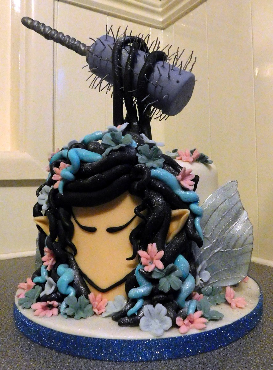 BarbsCakes's tweet photo. Fairy's and hairdressing combined was the brief so i went a bit crazy and made a floating hairbrush cake :) https://t.co/ADnN43uMOw