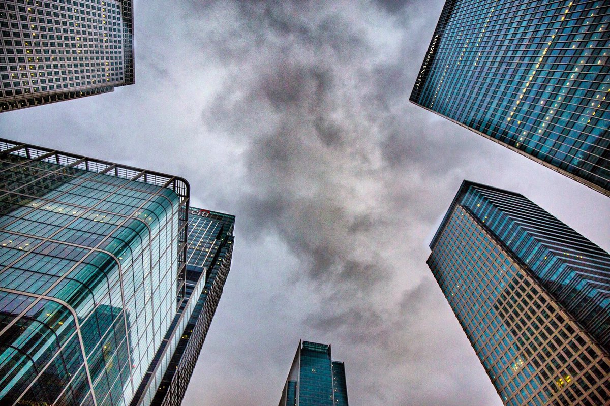 sophiadiane93's tweet photo. Things got moody in Canary Wharf yesterday! 🌧 #photography #architecture https://t.co/8AJ6OxIz4X