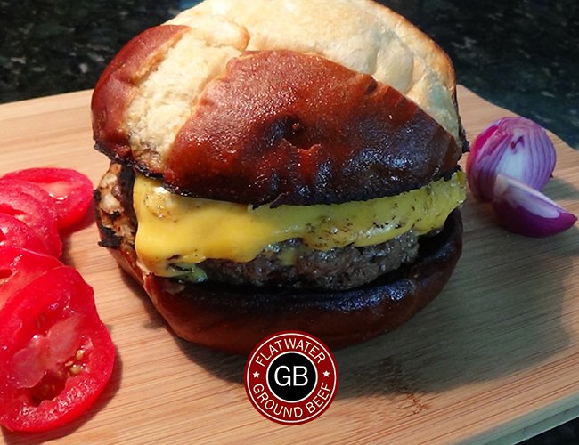 FlatwaterBeef's tweet photo. Pretzel bun cheeseburger using our amazing Dry Aged Ground Beef. Add it to any order at https://t.co/KQSasLdPeU #beefcountry https://t.co/1x2KwLiWBL