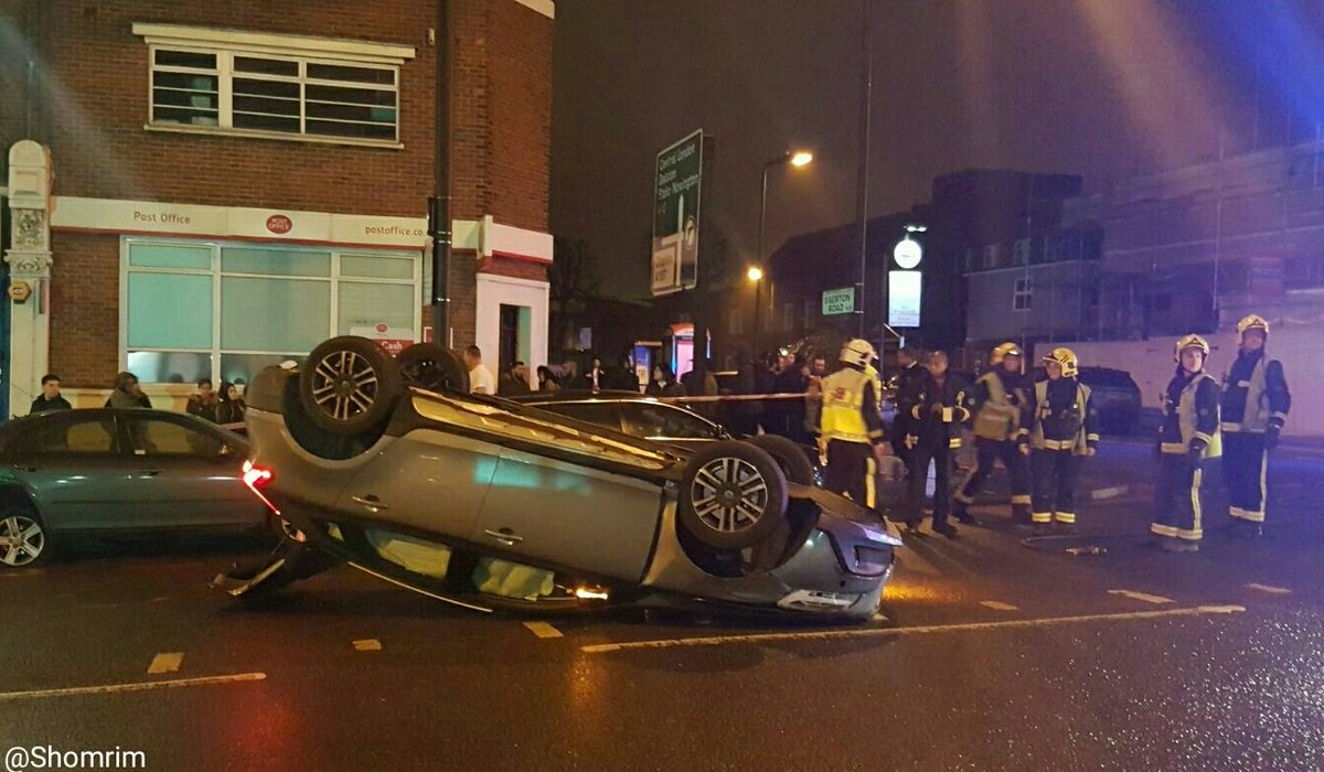 Shomrim's tweet photo. Overturned vehicle on Stamford Hill junction Egerton Road #N16, after losing control and colliding with a parked car. Driver fled the scene https://t.co/E9UBEeSYvO