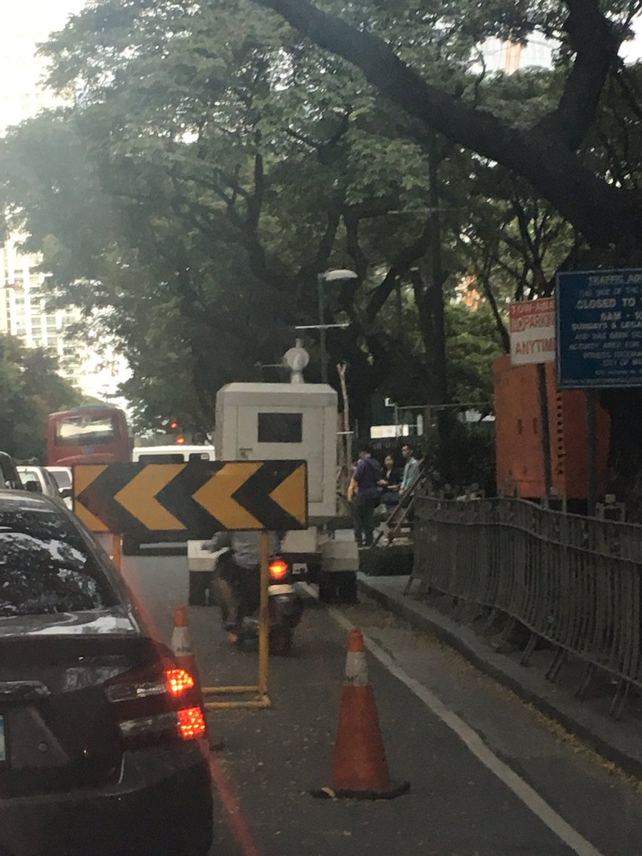 Mark_Flores's tweet photo. @MakatiTraffic This hazard causes traffic build up along Paseo! Can it not be placed on the sidewalk like the other generator?! https://t.co/TM4DaQQdG6