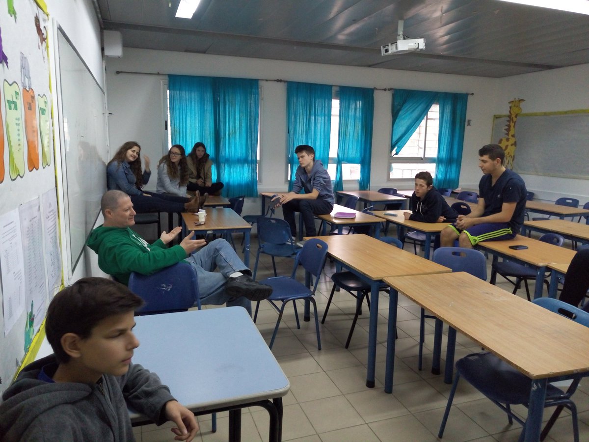 talking with our mentor about the upcoming competition