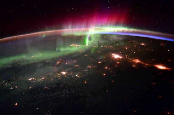SPACEdotcom's tweet image. This stunning, colored photo of the light show that was taken from the International Space Station in January 2016.  goo.gl/GBMm4h