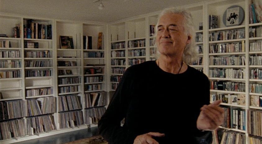 Happy Birthday to Jimmy Page! Here\s a clip of him playing \"air guitar\". Cute! 
