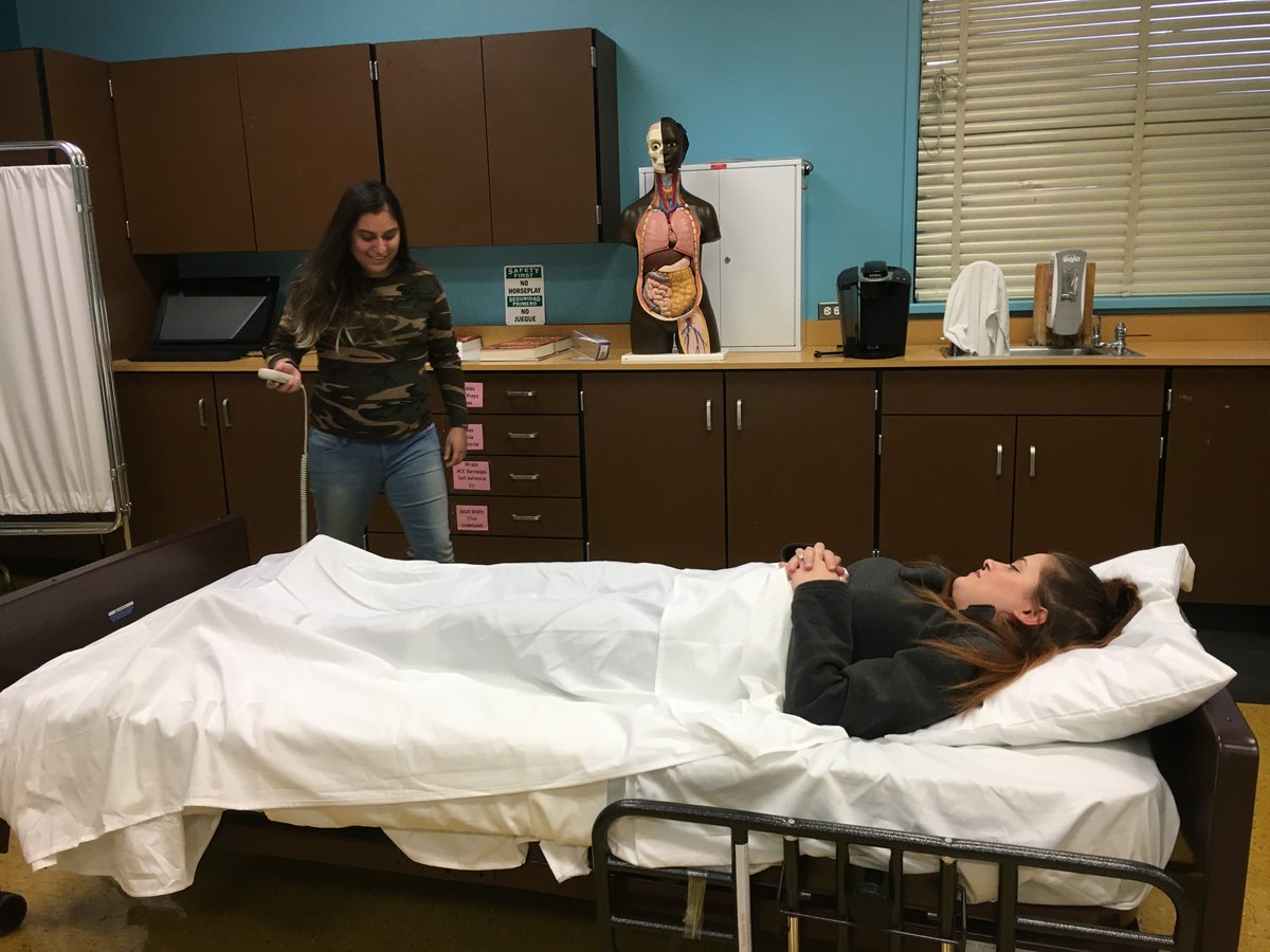 CliftonHealthSc's tweet photo. Students practice transferring patients into and out of bed #CNASkills https://t.co/JD3lkUtJua