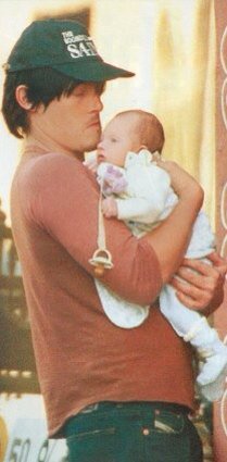 "Daddy! Daddy! <a href="/RecklessBowman/">Daryl Dixon</a> I found more pictures of us!" She smiled