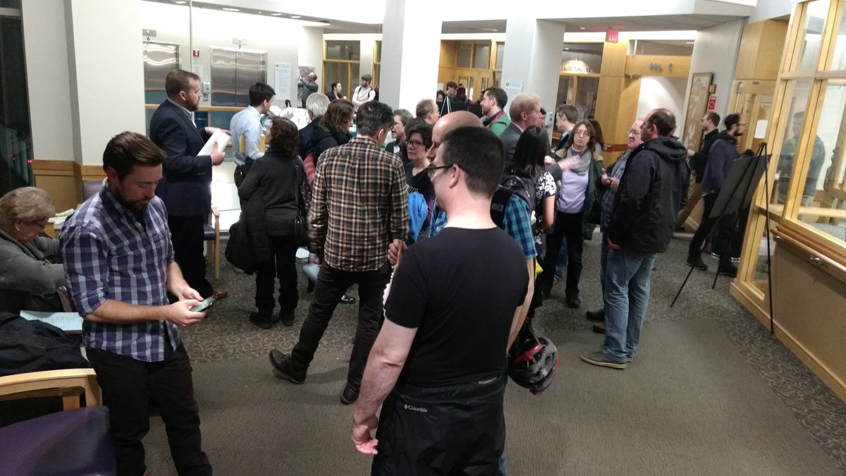 eligerzon's tweet photo. Arrived late & still many here @ #CambMA meeting on a new intersection design for Inman Sq. Most in support of #peanutabout: good for bikes! https://t.co/OxFQBcQLcV