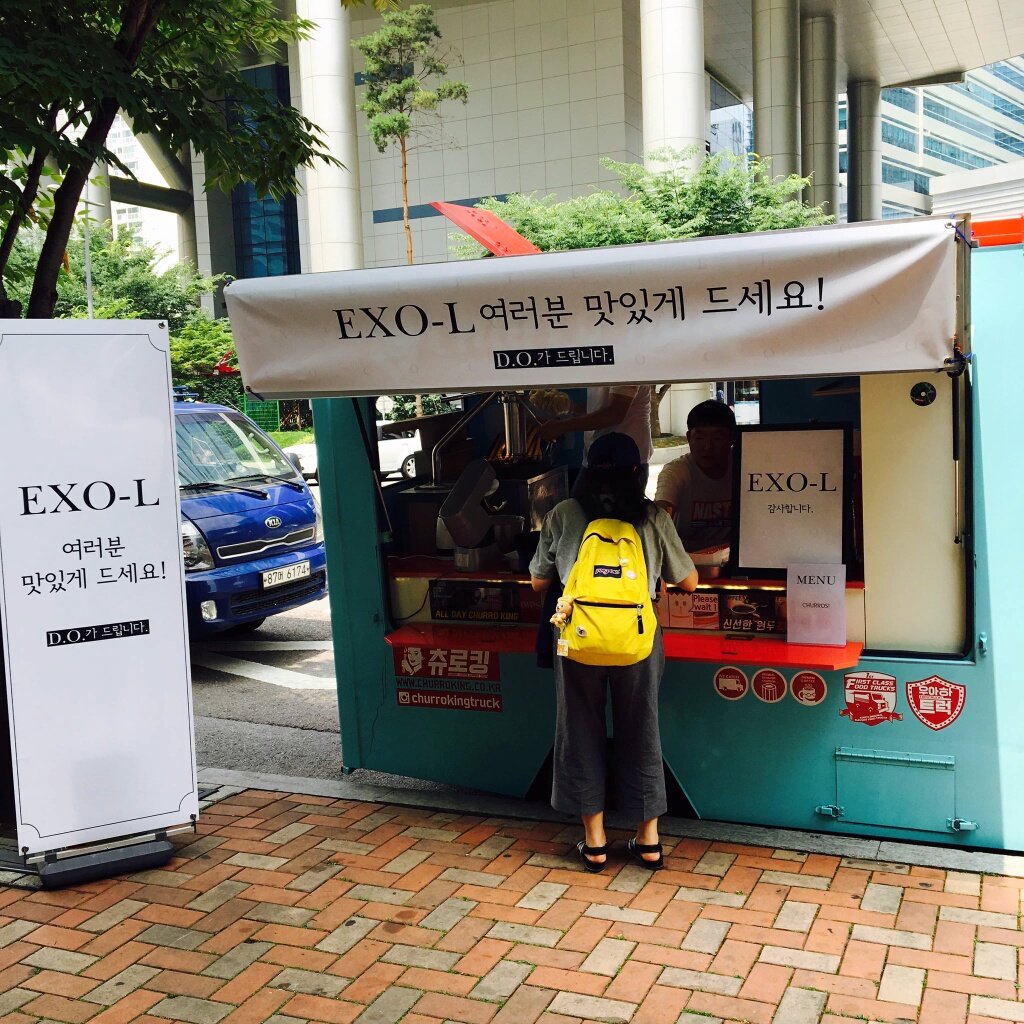 chanyeol & kyungsoo prepared food trucks for fans who attended during their monster nor lucky one promotions