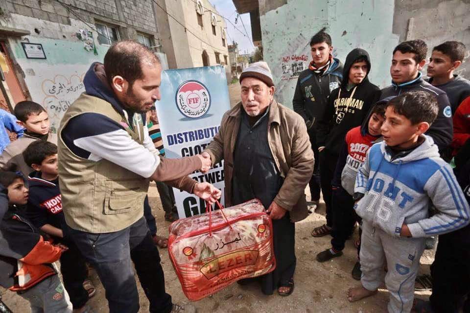 saadi4pak's tweet photo. #FIFPakistan started distribution of cloths, blankets and footwear in #Gaza.
#FIFinGaza #WinterPackage2017 #Donate https://t.co/i5Ed9HfoiZ