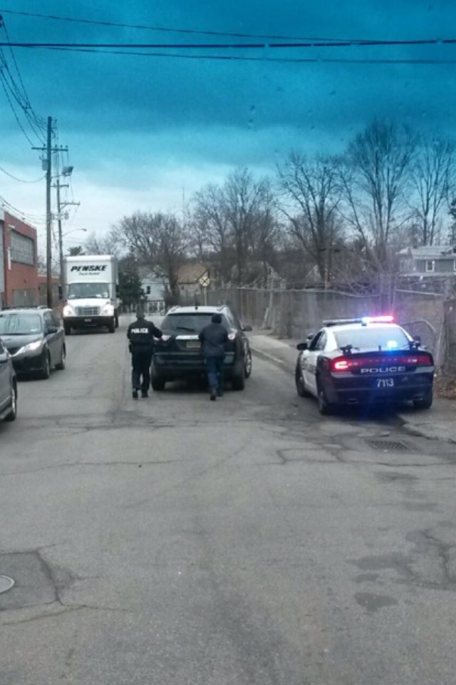 RPScan's tweet image. Spring Valley police helping out with a car that ran out of gas.