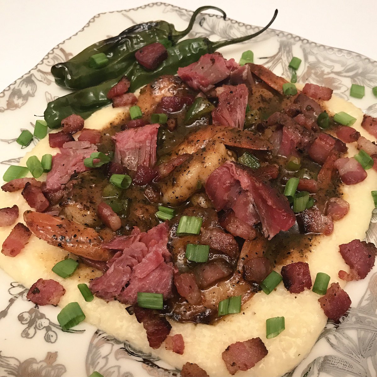 grill_momma's tweet photo. @TraegerGrills smoked @PorkUniversity #garlic101 pork cheeks from @CheshirePork & shrimp, cheesy grits, @MelissasProduce shishito peppers https://t.co/OKU7X2RaRy