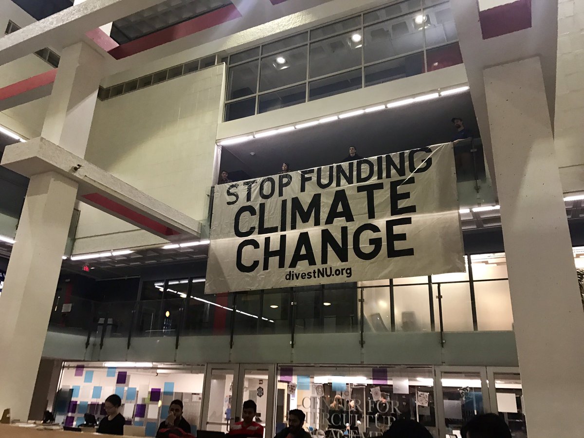 NEU students drop a huge banner to #ResistRejectDenial #divest <a href="/350/">350 dot org</a> <a href="/350Mass/">350 Mass</a> @GoFossilFree