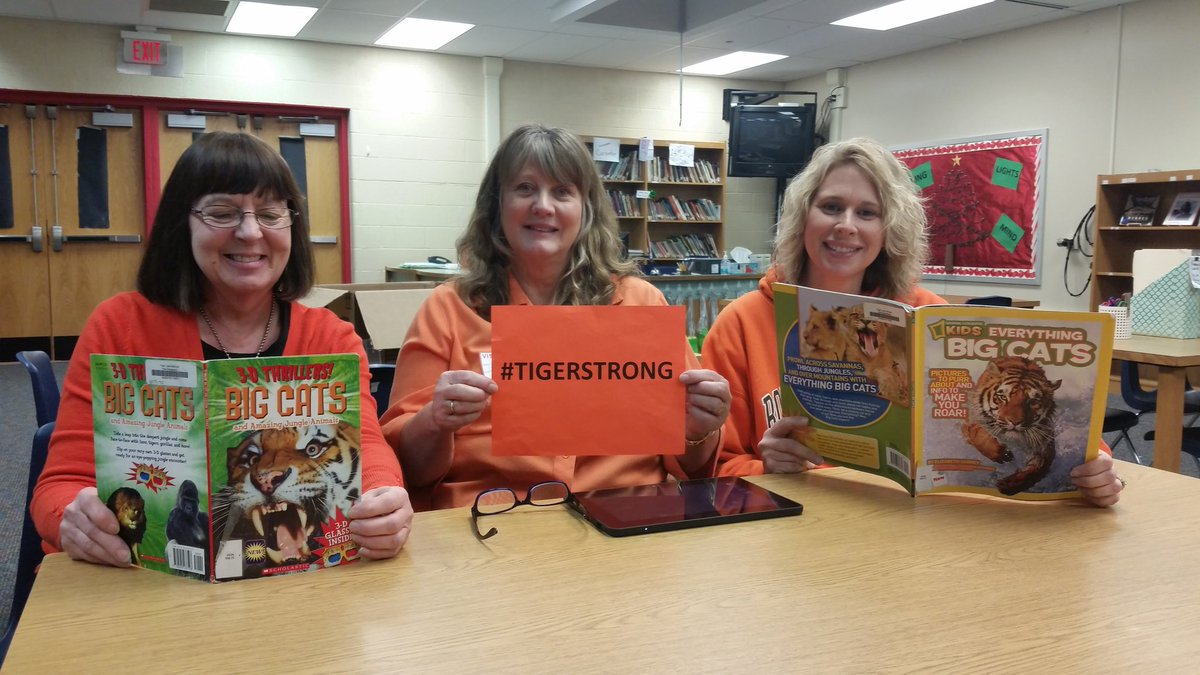 LClaypoolTriad's tweet photo. Triad librarians (and friend) know the hot topic of the day is TIGERS! #TigerStrong https://t.co/FhvCkW3rnn