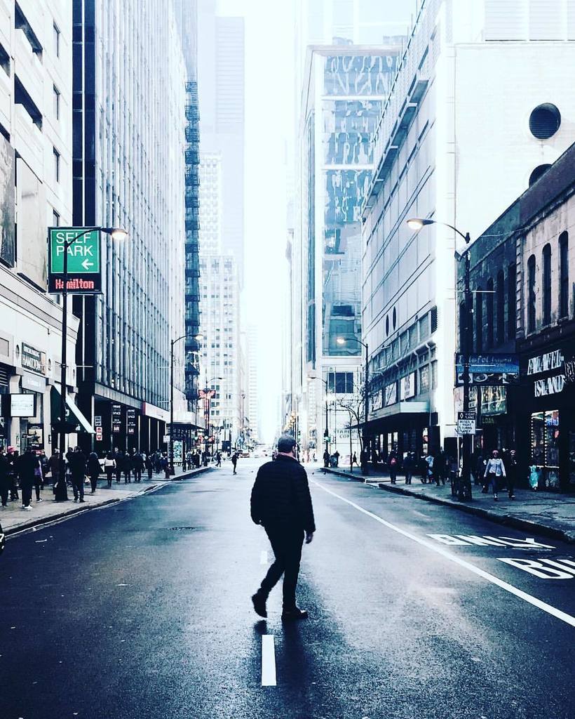 Dude crossing street (at Chicago Loop)