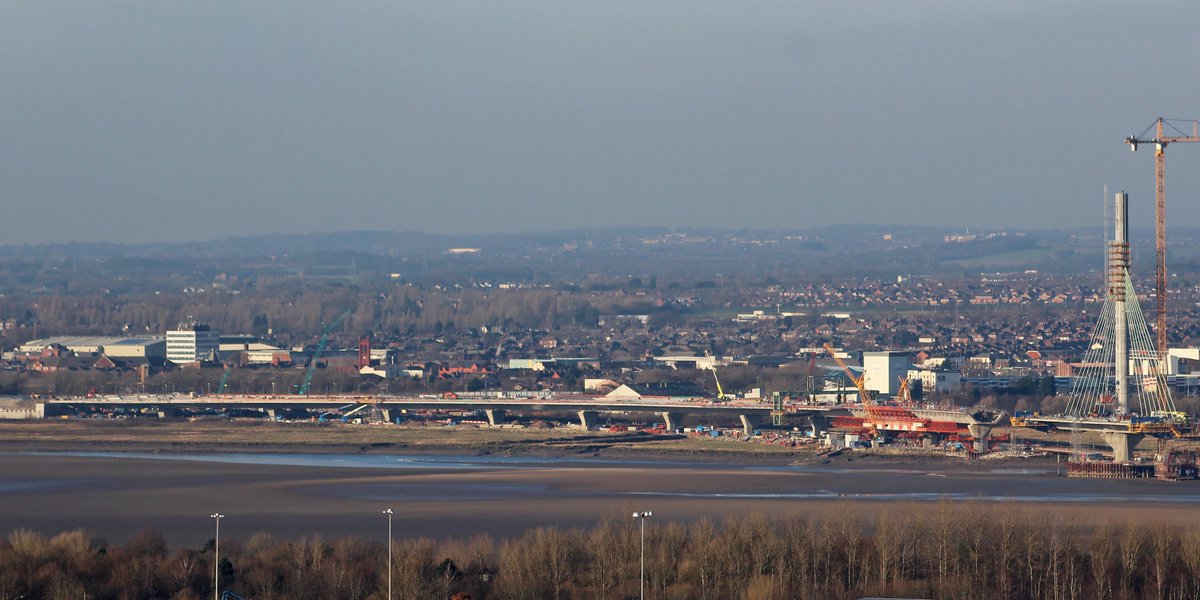 merseygateway's tweet image. The full length of the north approach viaduct viewed from across the Mersey