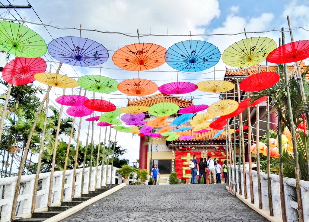 firsttimetravel's tweet photo. Colorful umbrellas at the Yuan Thong Temple in Bacolod City, Philippines for the Chinese New Year. #bloggingsoon #travel #TravelTuesday https://t.co/qlGJti1SIV
