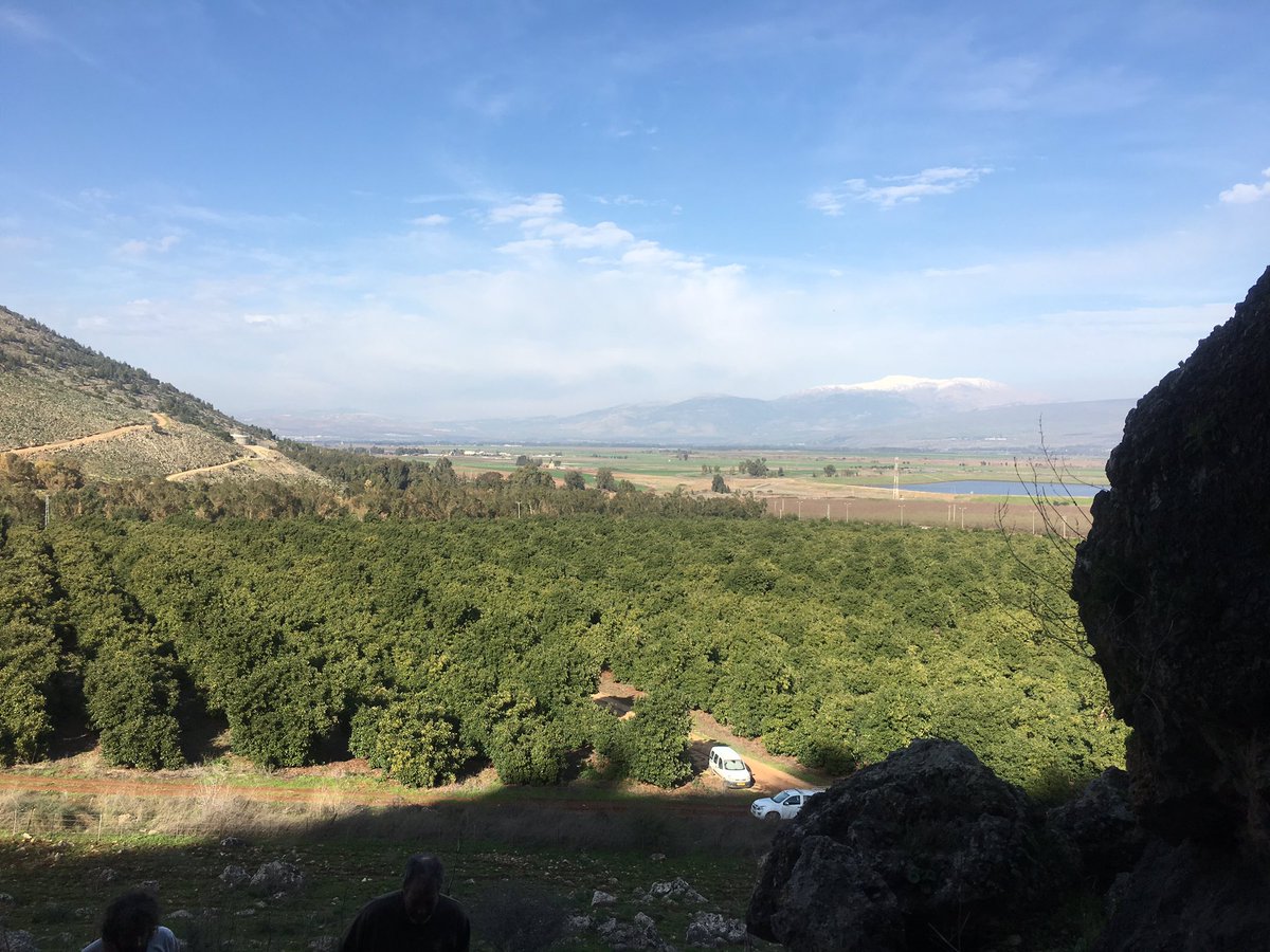 icouzin's tweet photo. In the Hula valley, Israel overlooking a snow-capped Mount Hermon. About to enter a bat cave. https://t.co/co7t3KE3sE