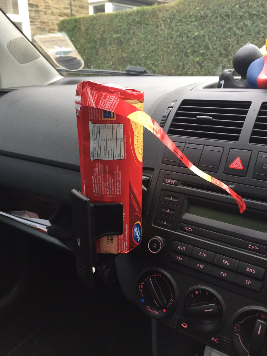 JoeRoughton's tweet photo. I have repurposed my cup holder #winning https://t.co/W1bRXfx1OH
