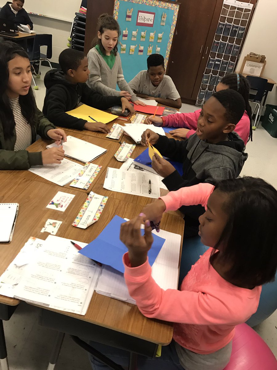 Hayes5thgrade's tweet photo. Today's math challenge: How can groups of 4 share 3 colors of paper equally? #handsonmath #introtofractions https://t.co/IeCkGEf9Xv