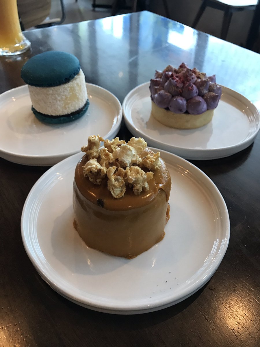shubanasheehan's tweet photo. These #desserts are from outer space! Salted caramel, bounty and lavender lemon curd tart. #spacekitchen @CBRFoodie @eatcanberra https://t.co/LLUYemcuv9