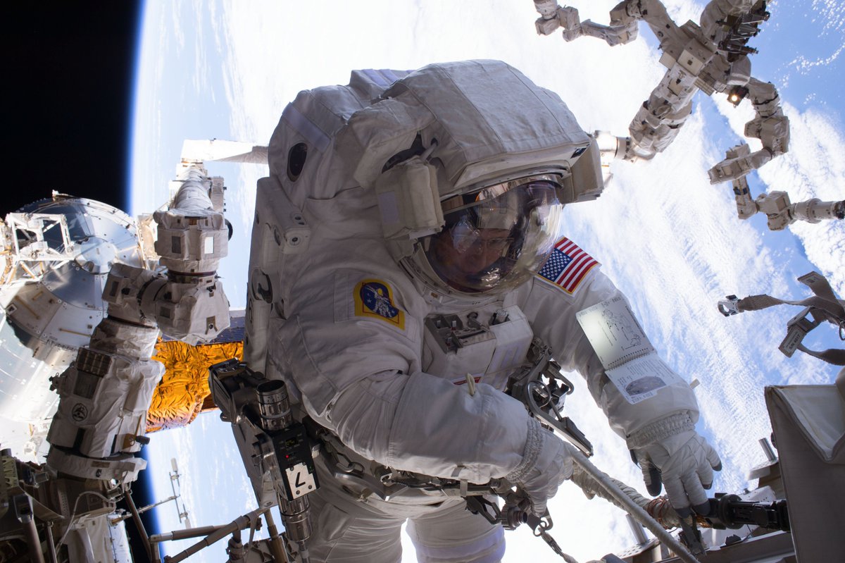 Space_Station's tweet photo. On @NASA TV now, live coverage of two spacewalkers preparing to begin a spacewalk today at 7am ET (12pm GMT). https://t.co/JPT0WVTFyZ https://t.co/xI0Dm7IPVR