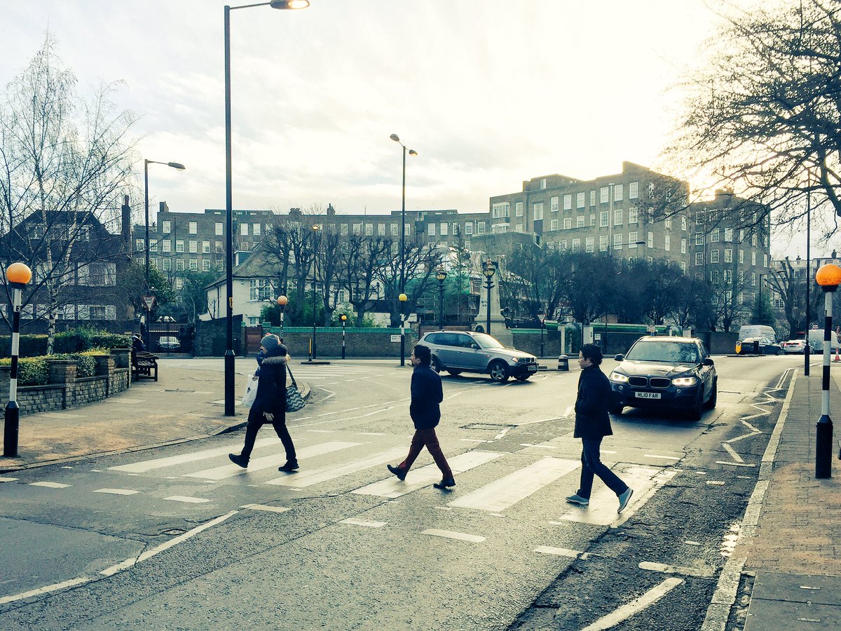 LacketyLac's tweet photo. Wrong direction, I know, but still, y'all, THE Abbey Road crosswalk! (Lin holding his kid makes four) https://t.co/jiXToDoWIB