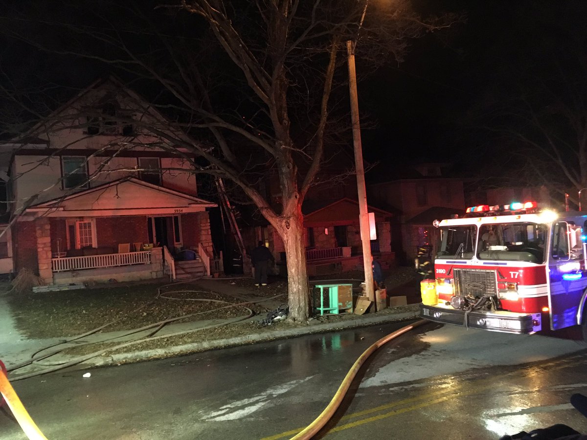 MattWDAF's tweet photo. @KCMOFireDept rescues a woman from the roof at 39 and Wyoming as flames fly high all around her. Nice work, firefighters! @fox4kc https://t.co/h8T3VXnvb6